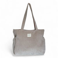 DE LA MUR beige corduroy zippered tote bag, front view with shoulder straps