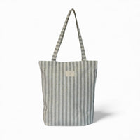 DE LA MUR Lugris striped zippered bag in gray and gold, front view