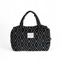 DE LA MUR Onix geometric jacquard XL makeup bag in black and beige, front view