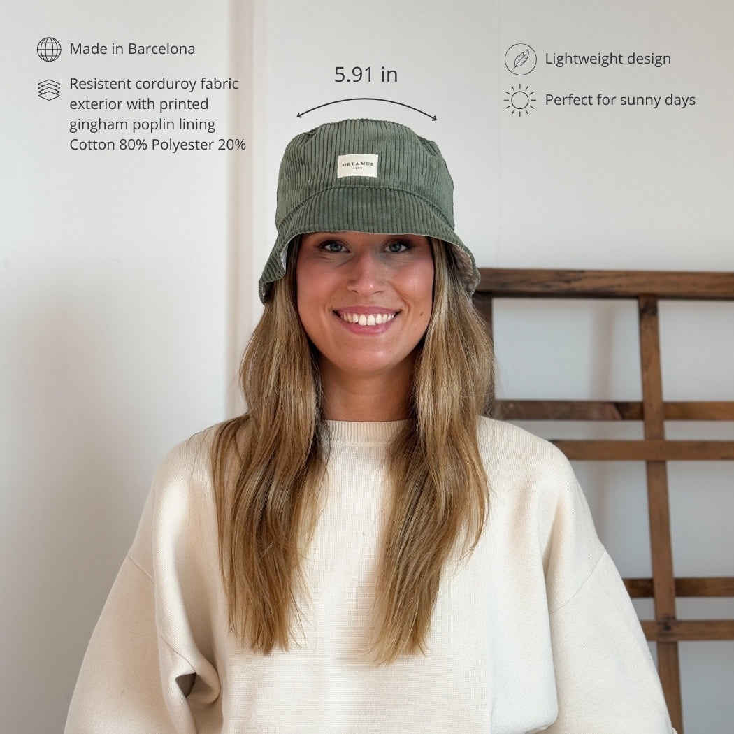 DE LA MUR green corduroy bucket hat features infographic with size and materials
