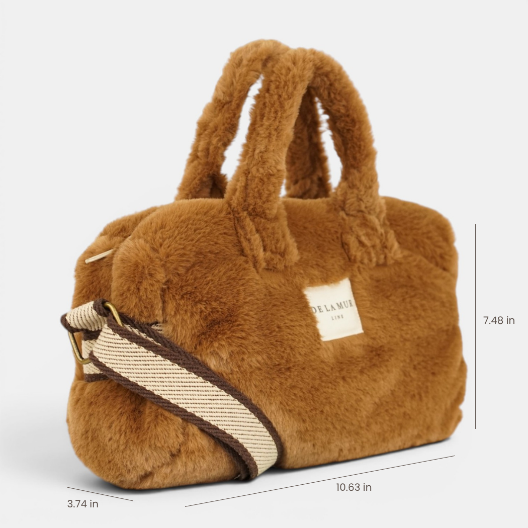 DE LA MUR camel brown faux fur small handbag, angled view with dimensions 10.63 x 7.48 x 3.74 in