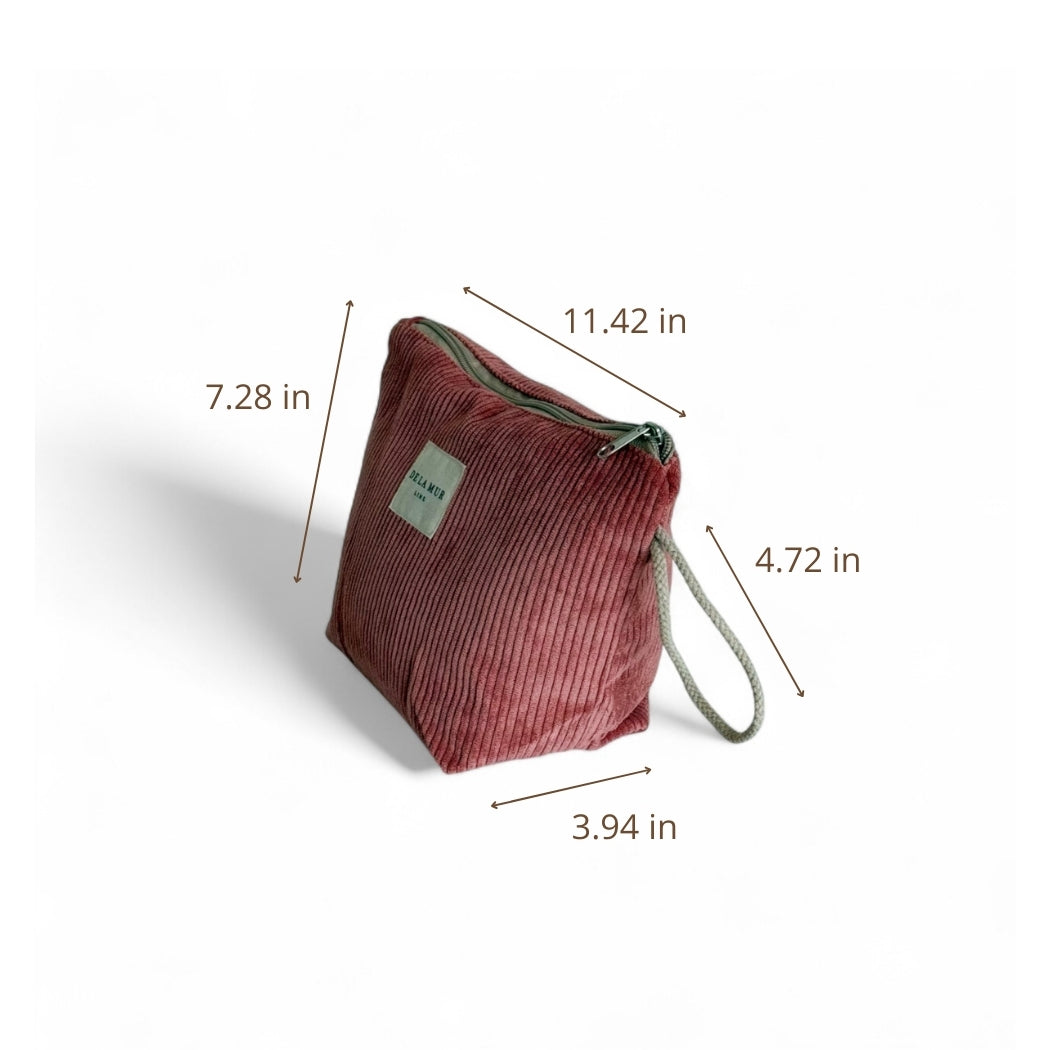 Three-quarter view of the pink Coral corduroy pouch with dimensions