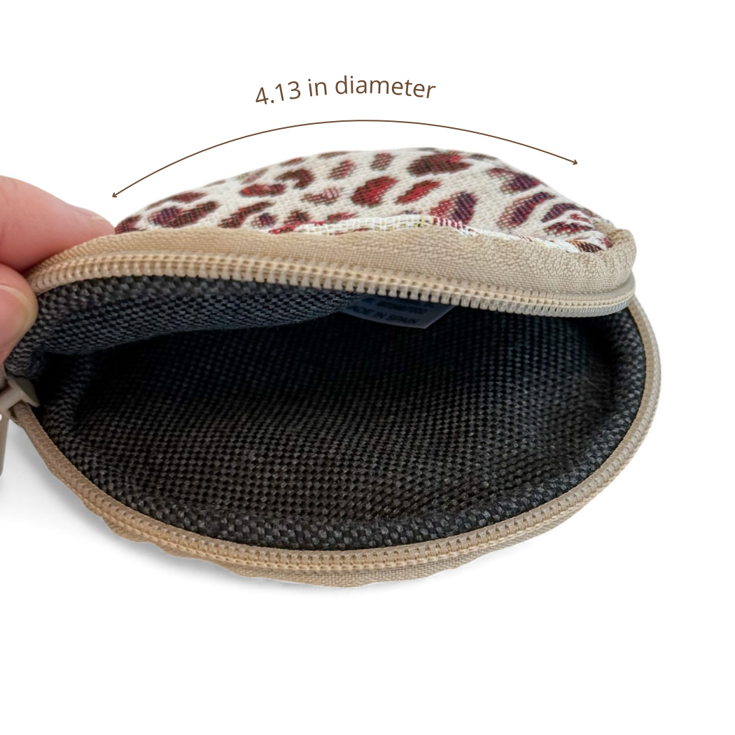 Open DE LA MUR leopard coin purse showing lined interior, 4.13 in diameter