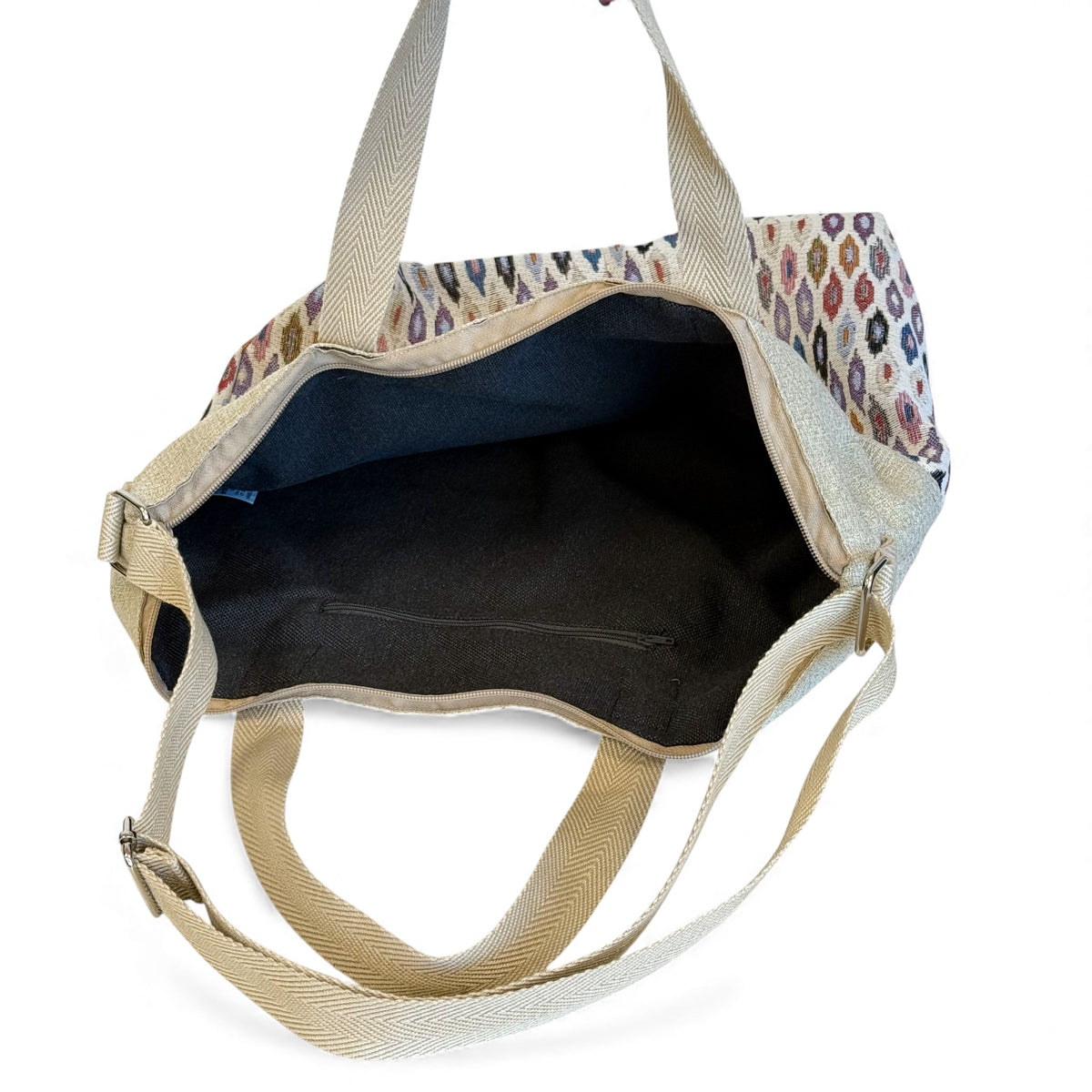 Open DE LA MUR Urban handbag showing the lined interior and crossbody strap