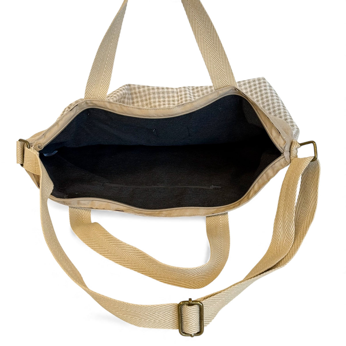 Open DE LA MUR Vison handbag showing the black lined interior and inner pocket