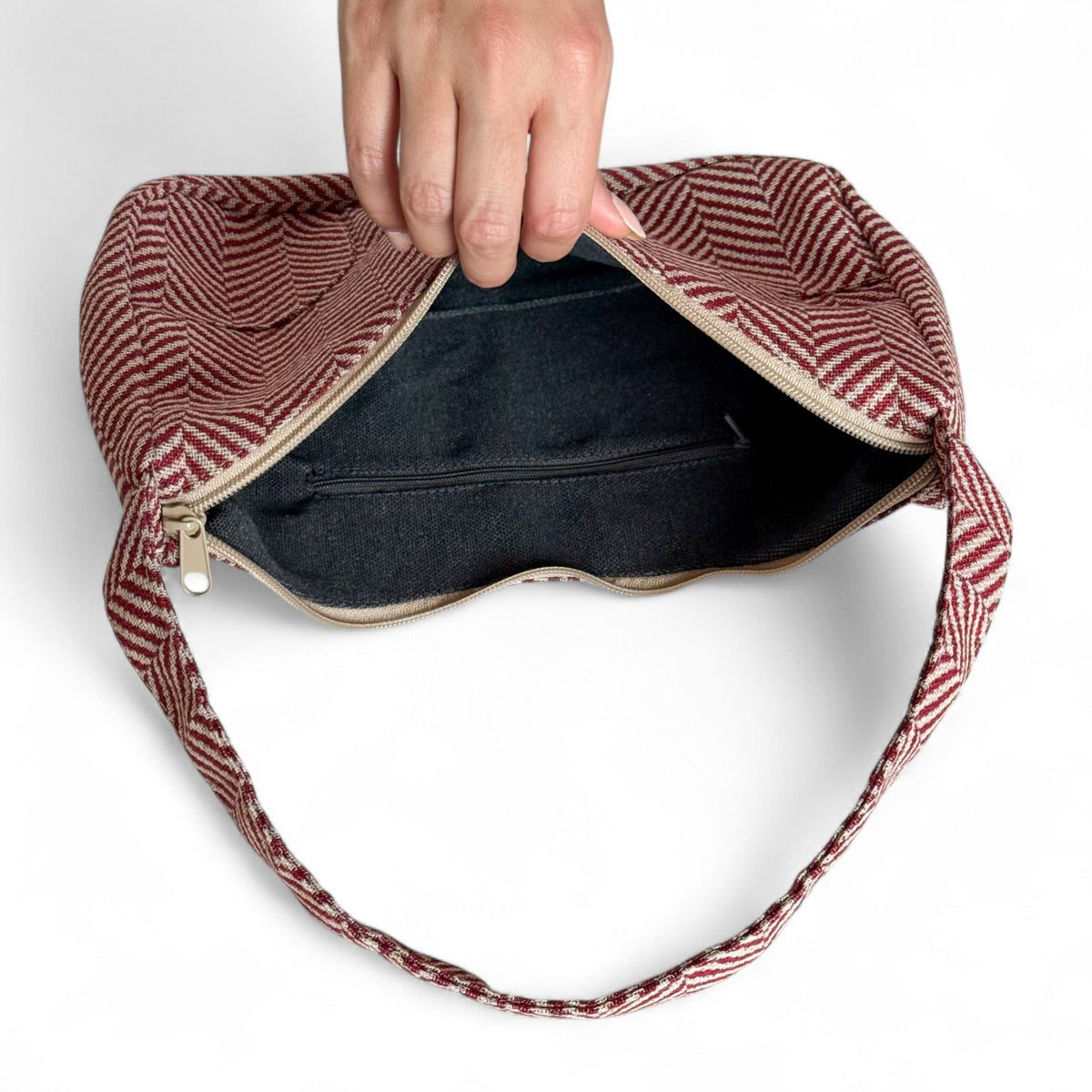 Open DE LA MUR Dubai shoulder bag showing lined interior with inner zip pocket