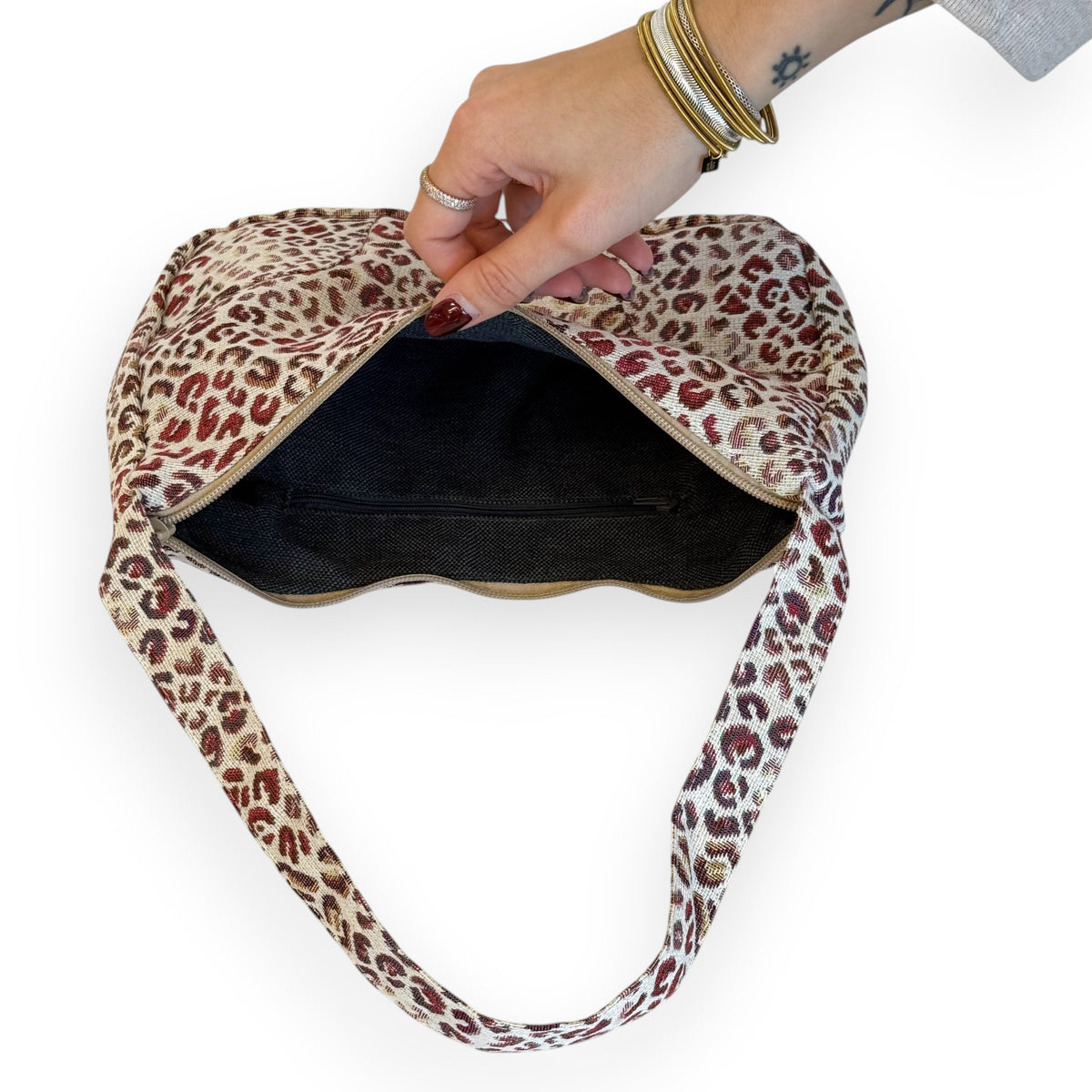 Open DE LA MUR Talco shoulder bag showing lined interior pocket