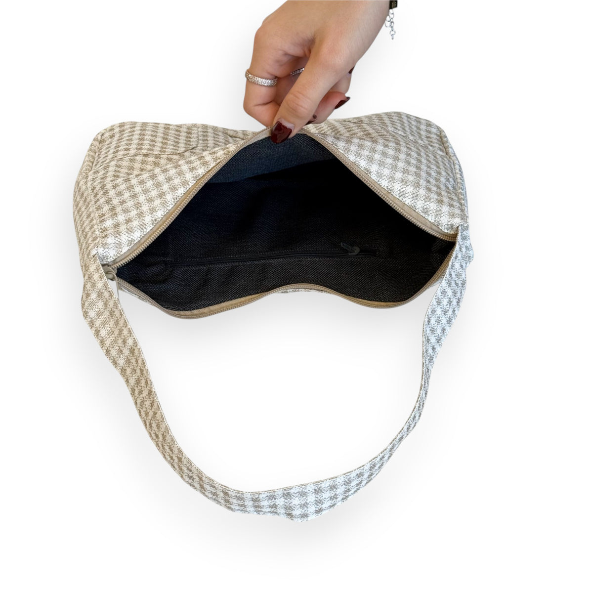 Open DE LA MUR Vison gingham shoulder bag showing lined interior