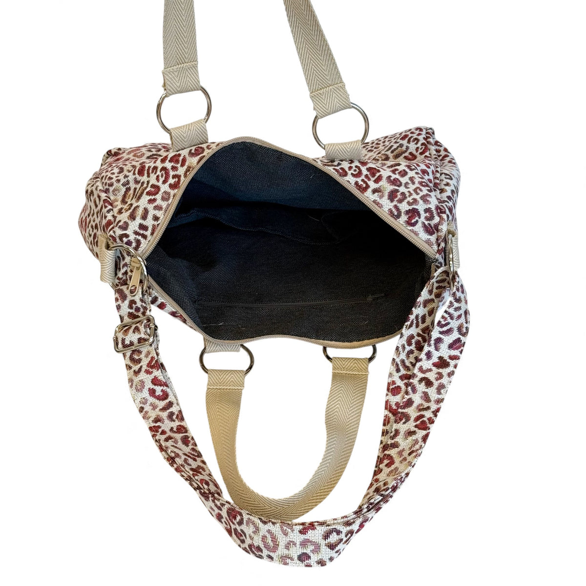 Open DE LA MUR Talco leopard city handbag showing lined interior