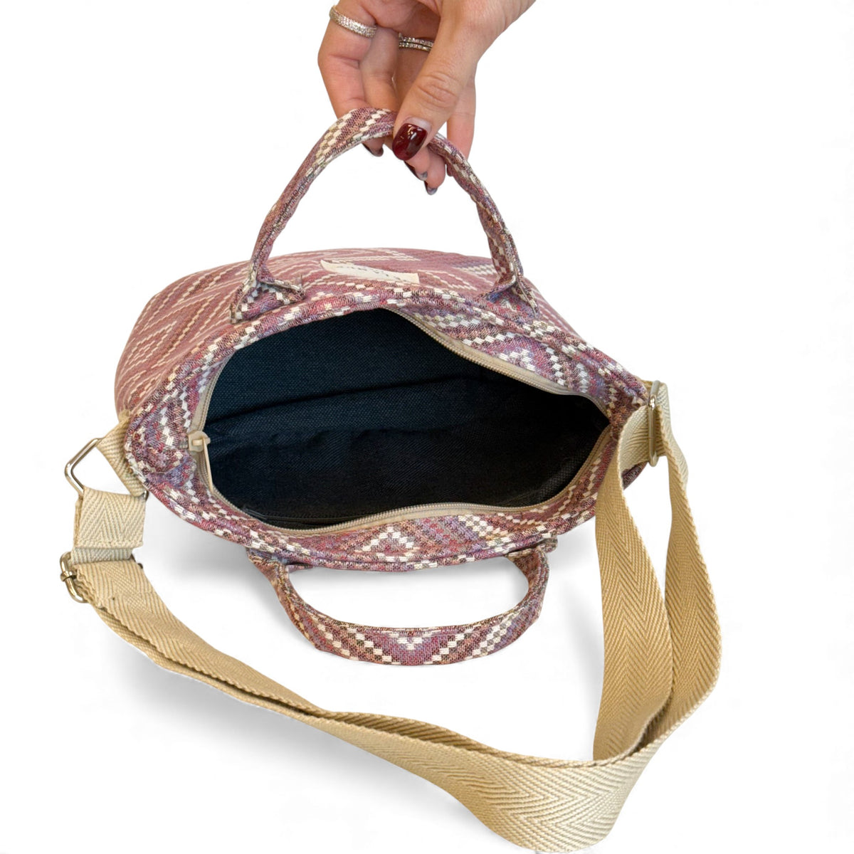 Open DE LA MUR Nana basket handbag showing the black lined interior
