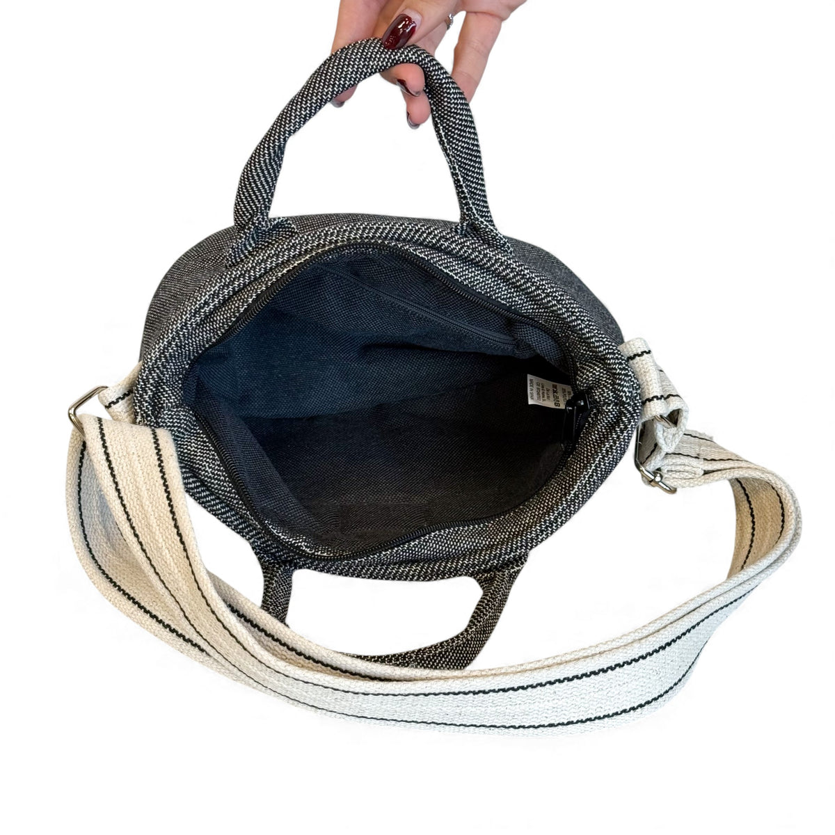 Open DE LA MUR Sinay basket handbag showing the lined interior