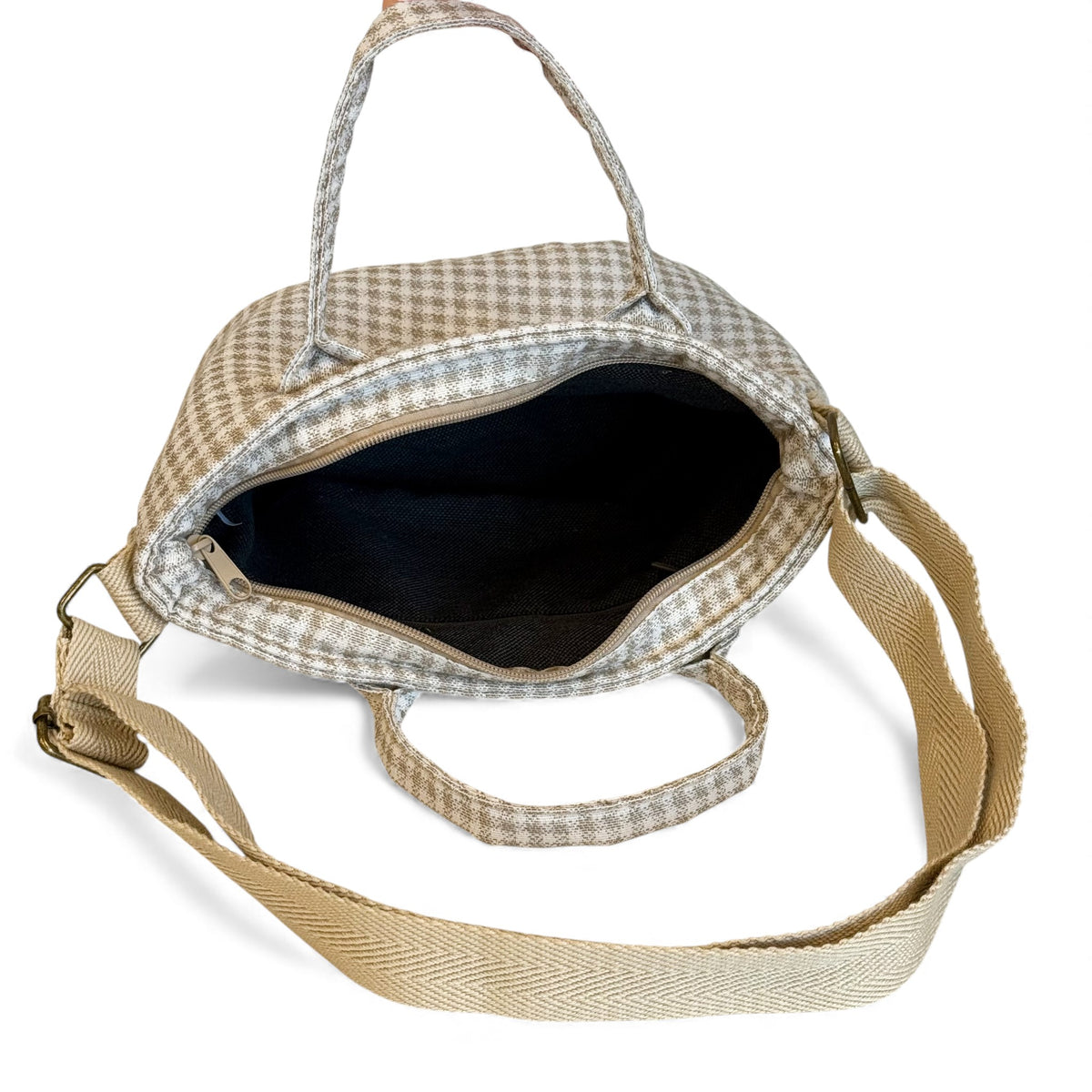 Open DE LA MUR Vison basket handbag showing the black lined interior