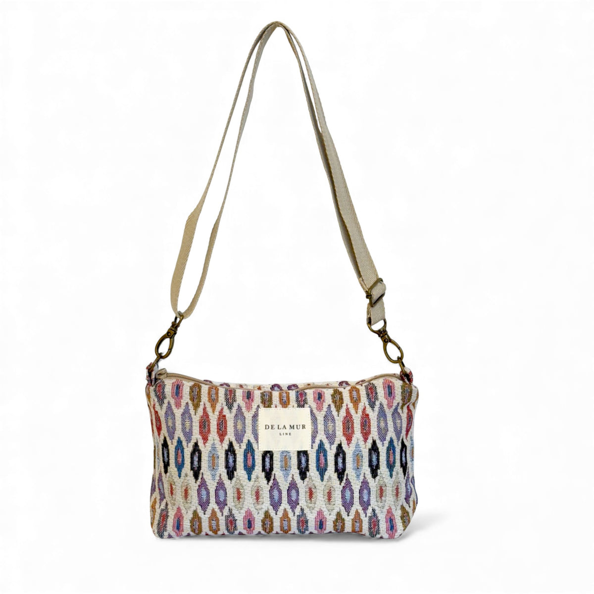 DE LA MUR Urban geometric jacquard clutch bag in multicolor, front view with crossbody strap