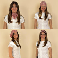 Model wearing the DE LA MUR pink floral scarf as neckerchief and headscarf