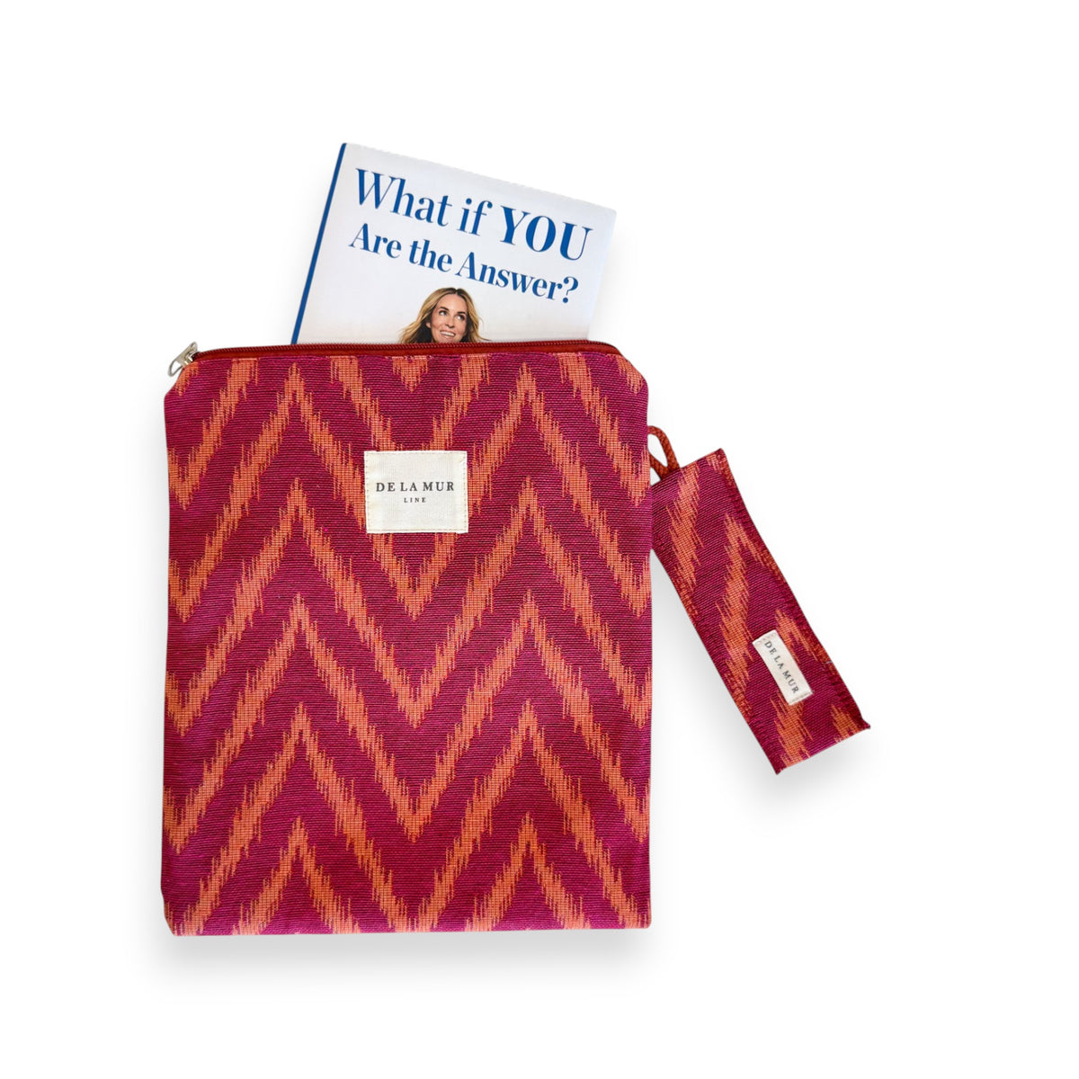 DE LA MUR Fuego book cover with a paperback peeking out and matching bookmark beside it