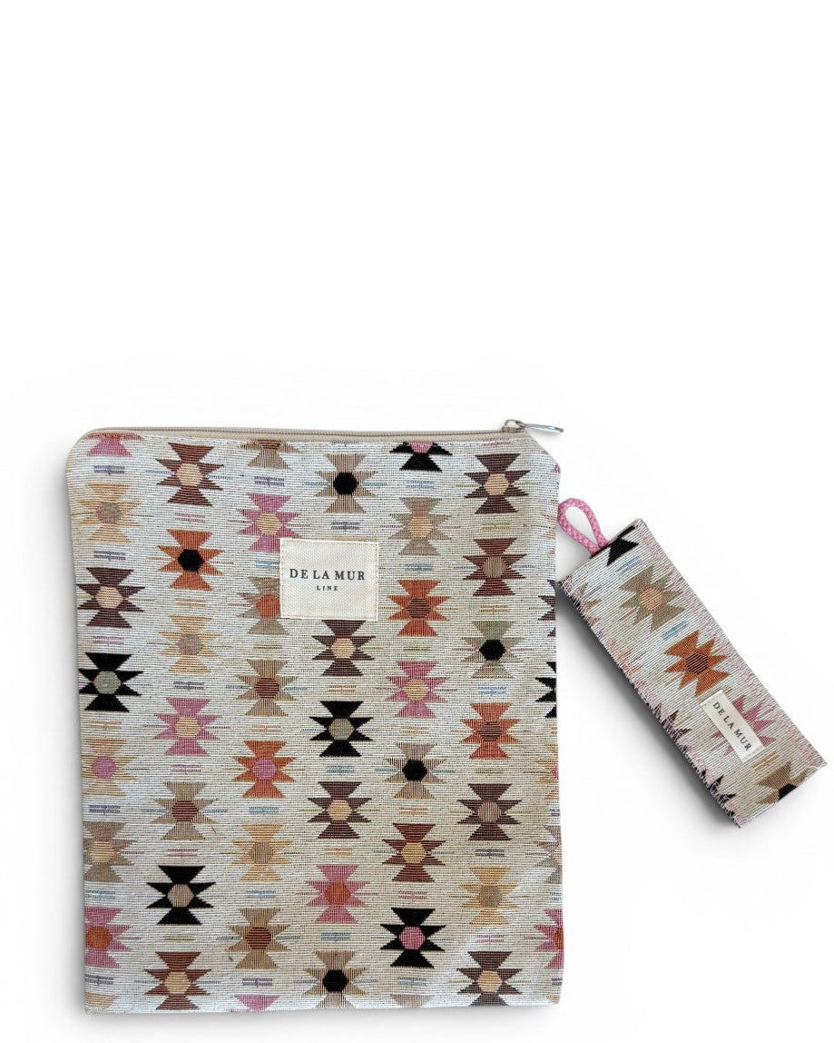DE LA MUR Royal geometric jacquard book cover in cream with pink and orange motifs and matching bookmark, front view