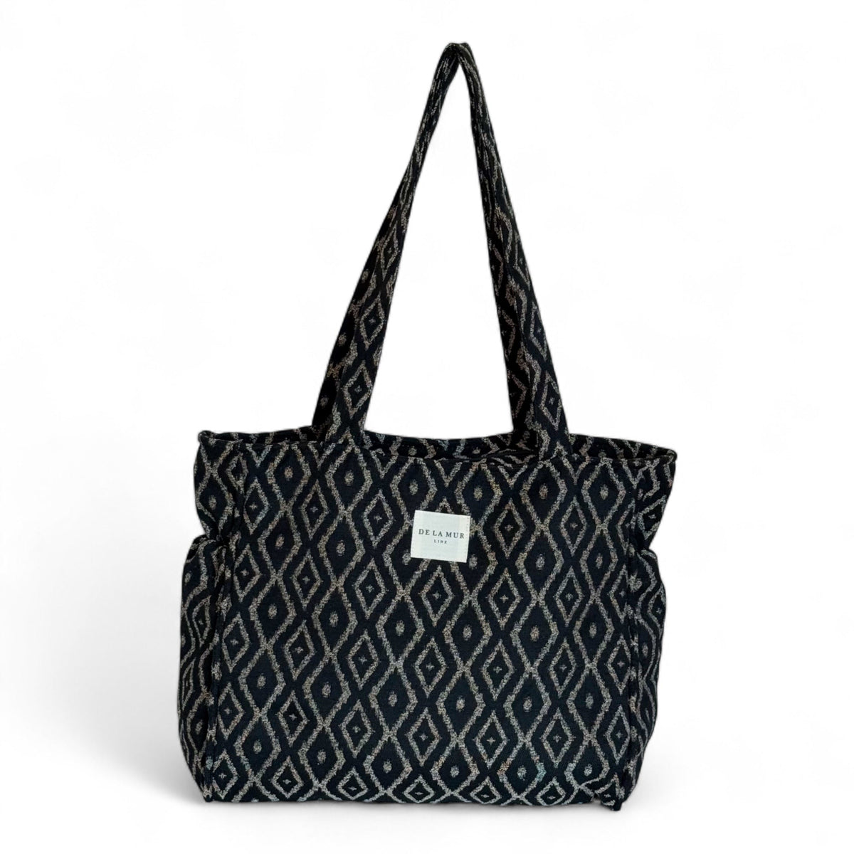 DE LA MUR Onix geometric jacquard zippered tote bag in beige and black, front view