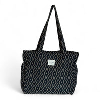 DE LA MUR Onix geometric jacquard zippered tote bag in beige and black, front view