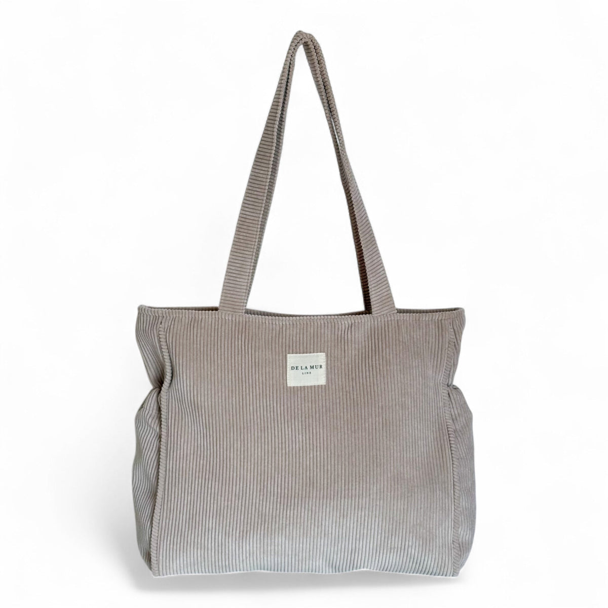 DE LA MUR beige corduroy zippered tote bag, front view with shoulder straps