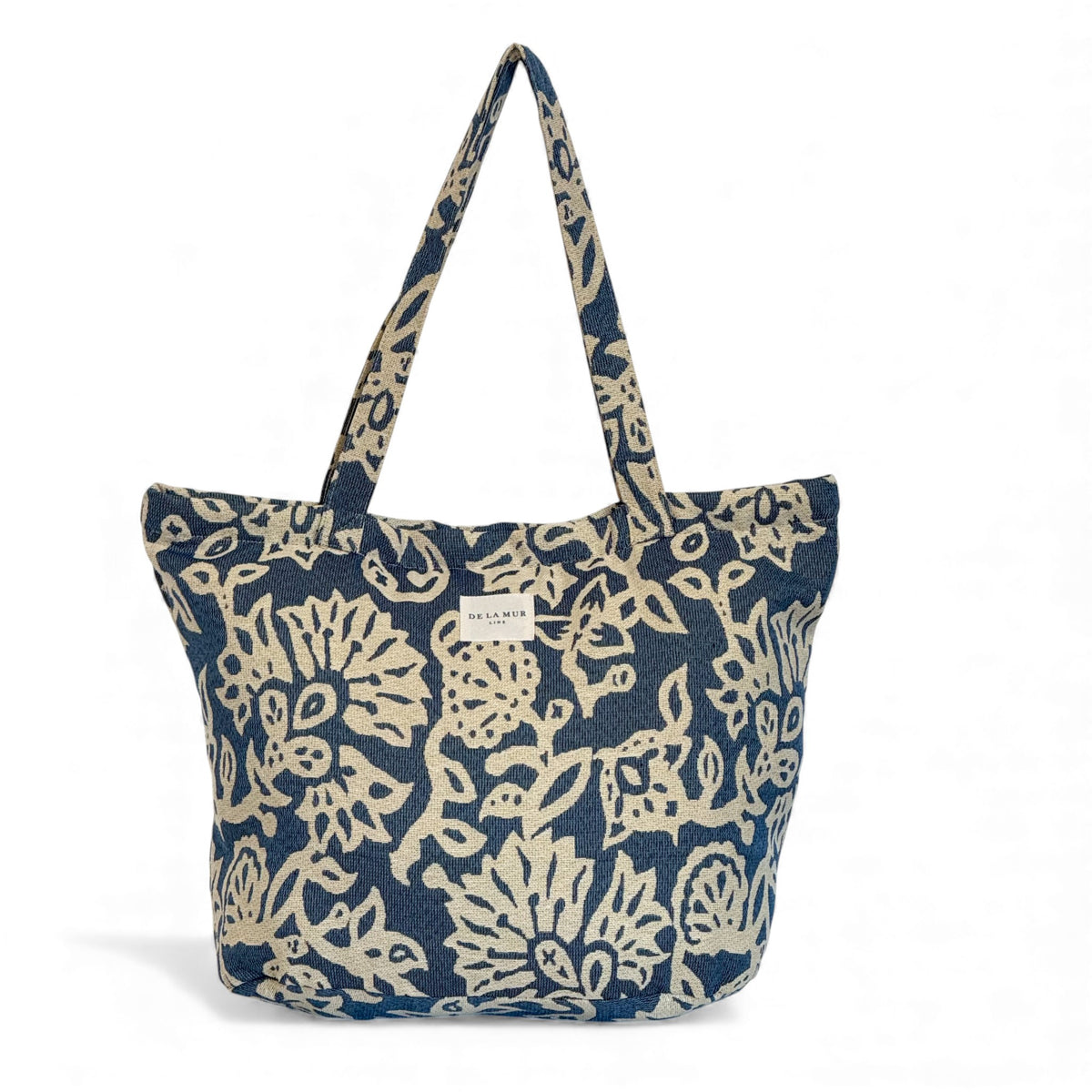 DE LA MUR Akay floral jacquard large zippered tote bag in blue and off-white, front view