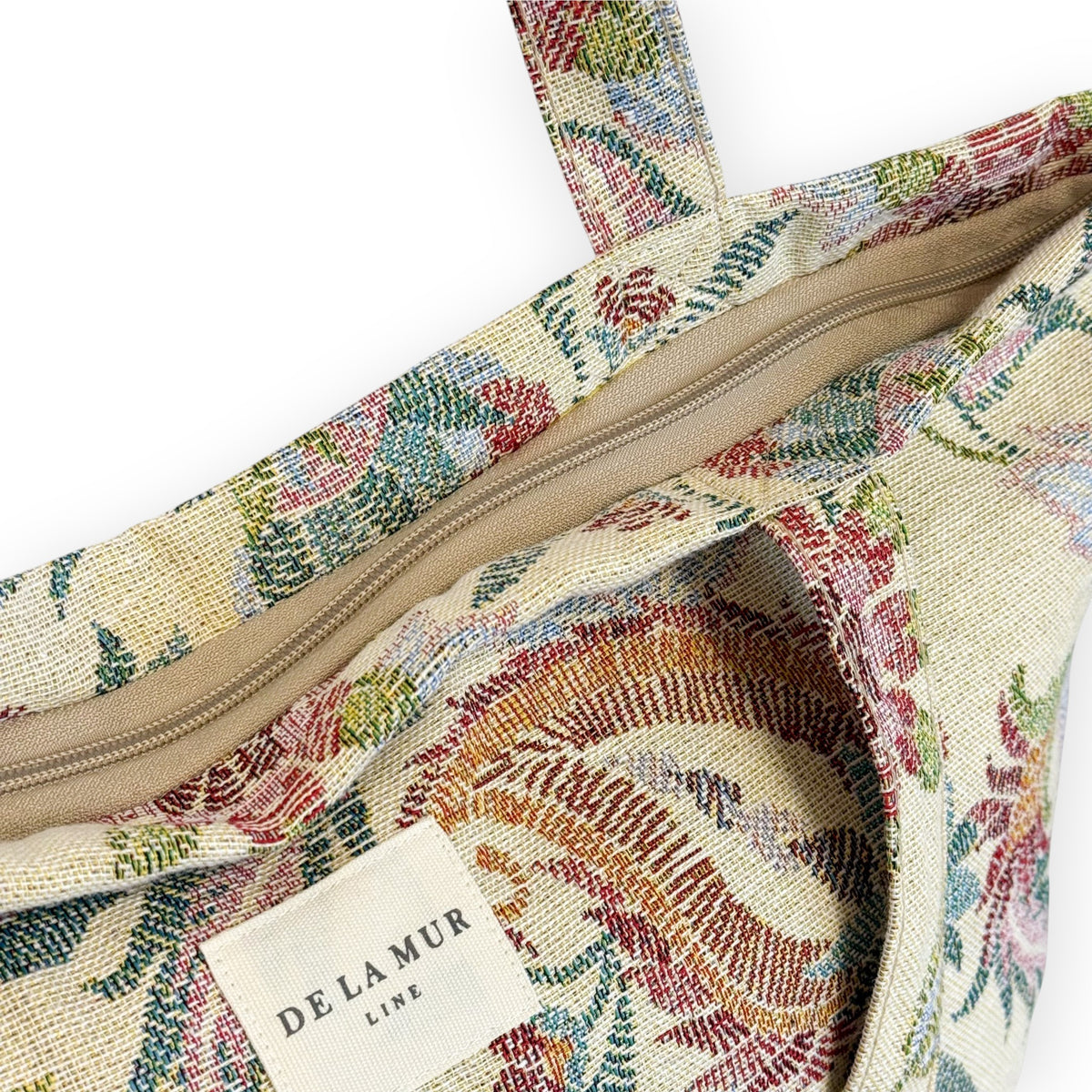 Open DE LA MUR Color tote showing the zip and lined interior