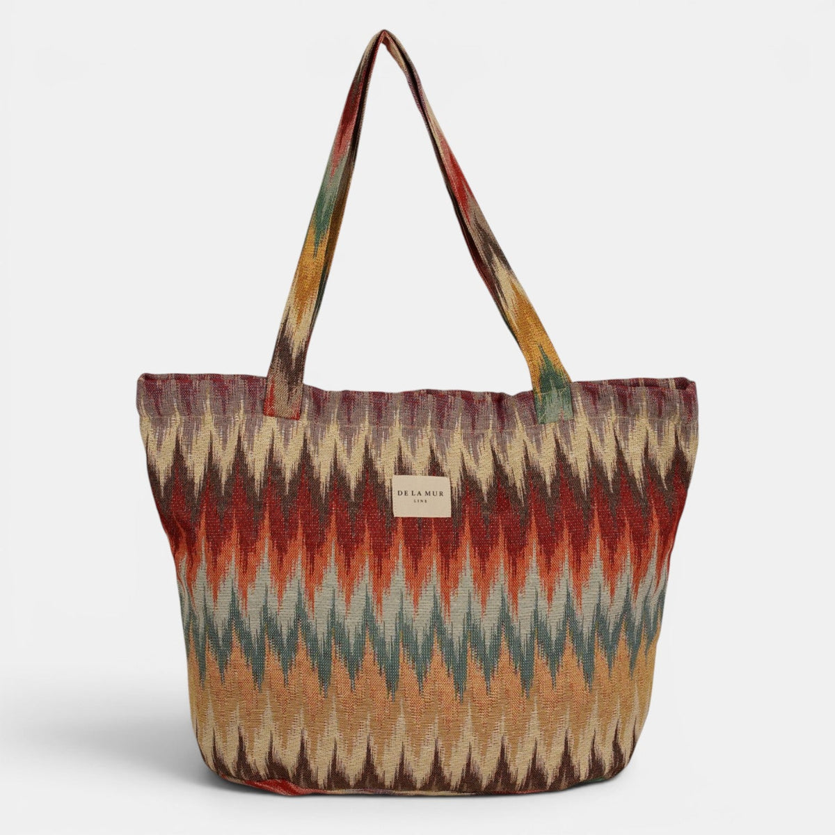 DE LA MUR Guana zigzag jacquard large zippered bag in warm multicolor, front view