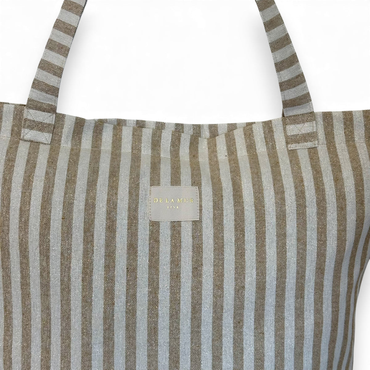 DE LA MUR mustard and gold striped tote bag back view with label