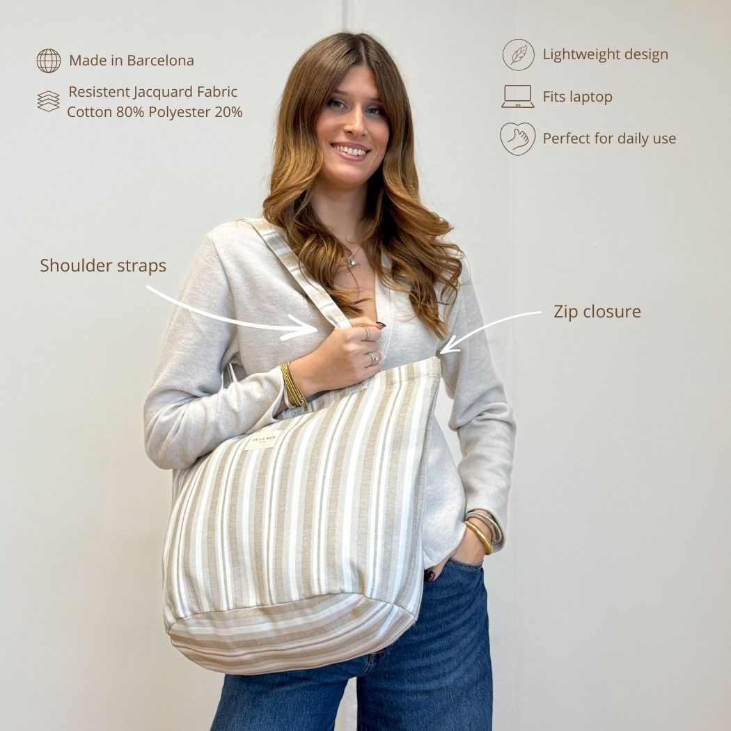 Model carrying the DE LA MUR beige jacquard tote bag, features infographic