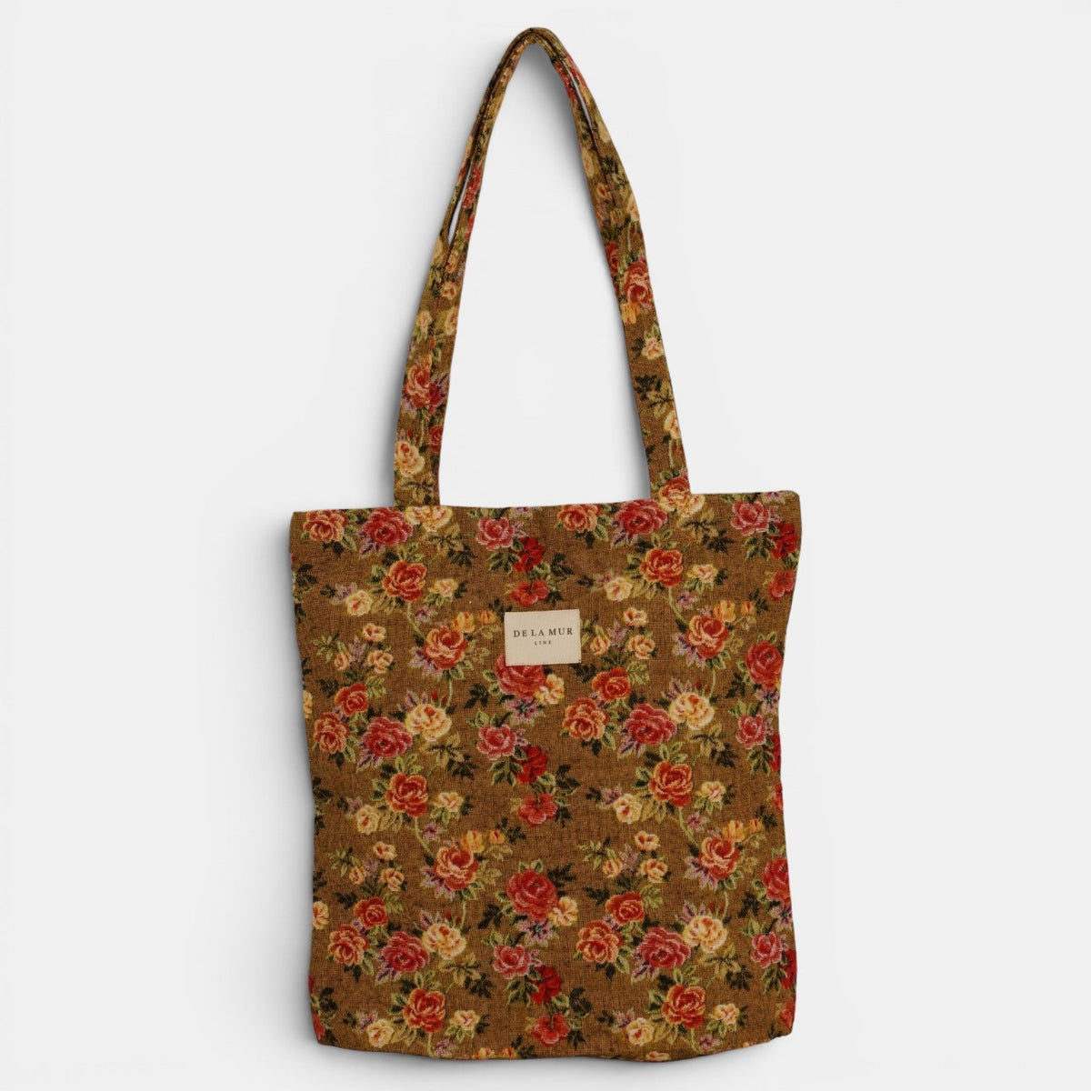 DE LA MUR Esme floral jacquard bag in mustard and red, front view with brand label