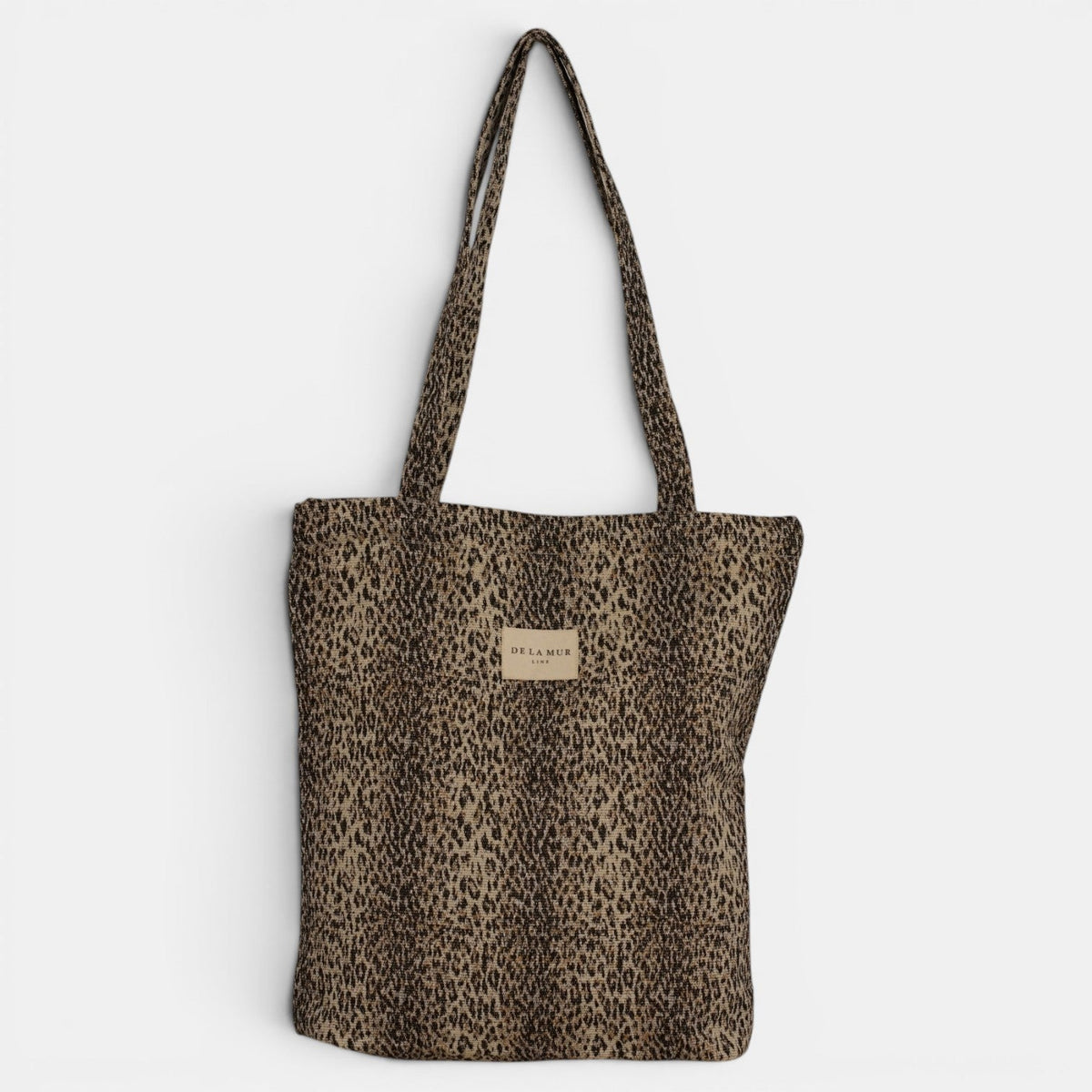 DE LA MUR Leo leopard jacquard medium zippered bag, front view with logo label