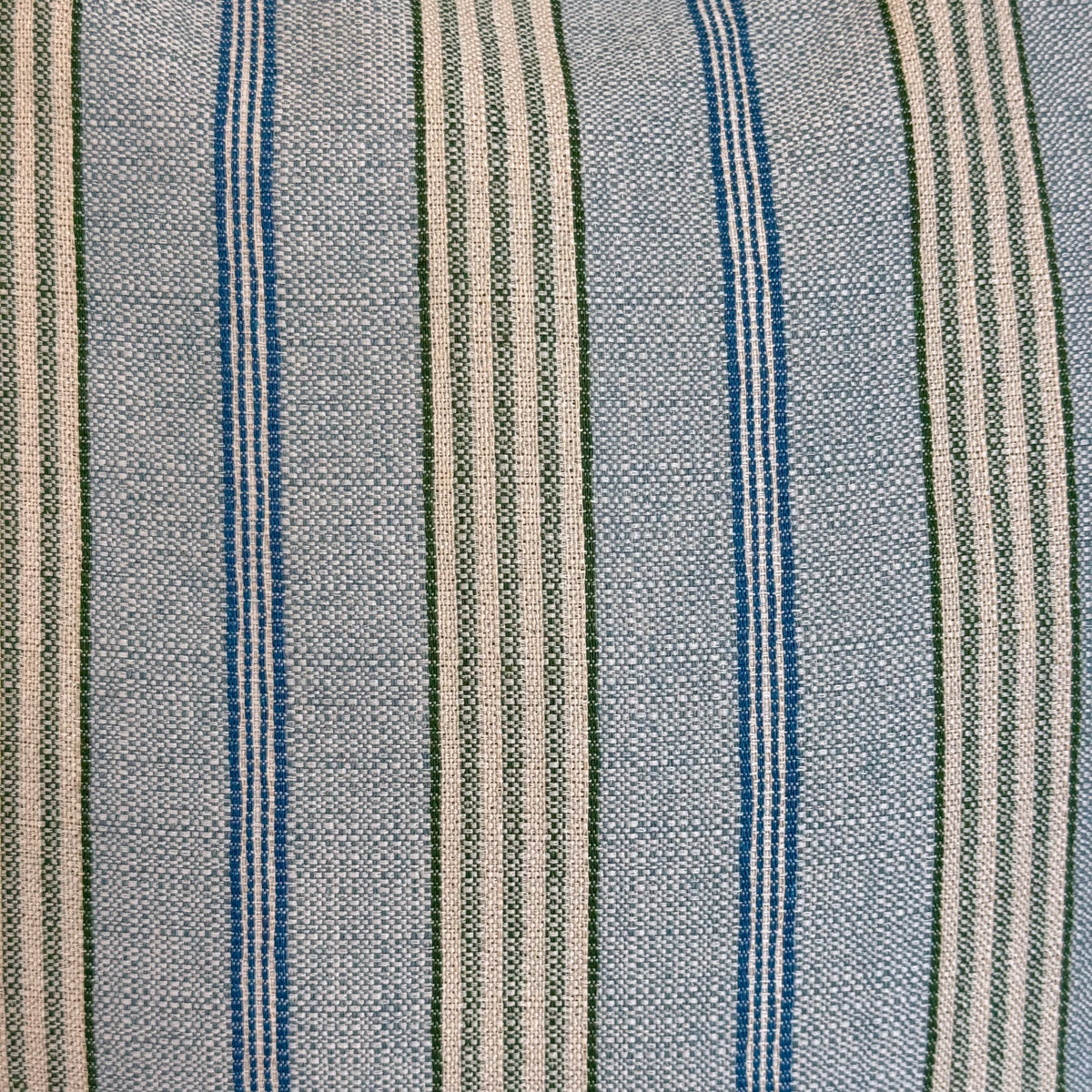Close-up of the green and blue striped jacquard fabric of the DE LA MUR Cata bag