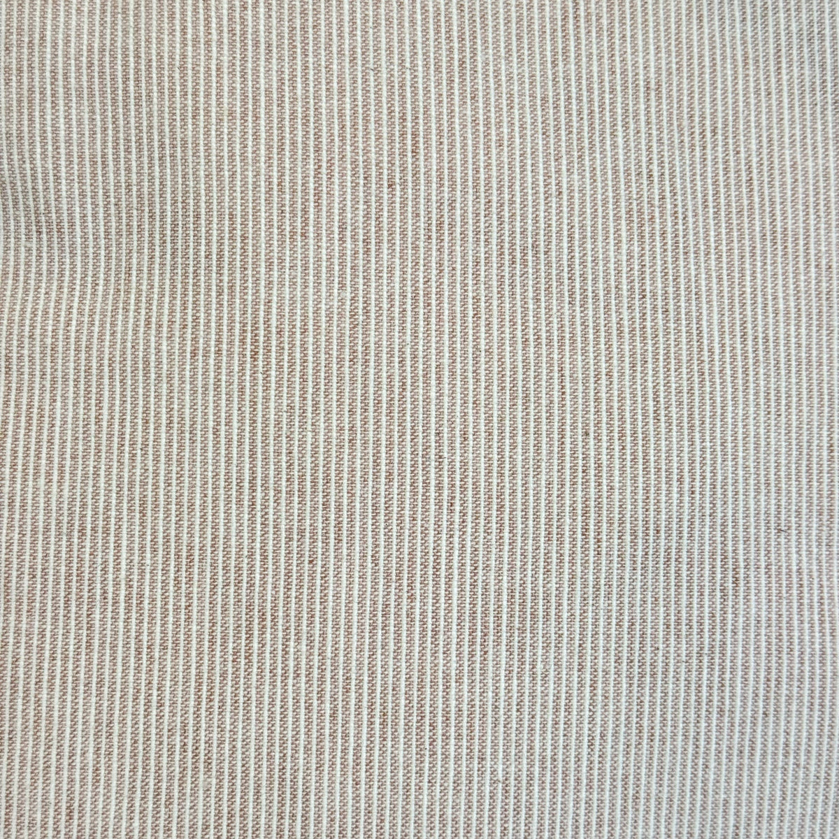 Detail of the soft pink and gray pinstripe textured fabric on the DE LA MUR Ibi bag