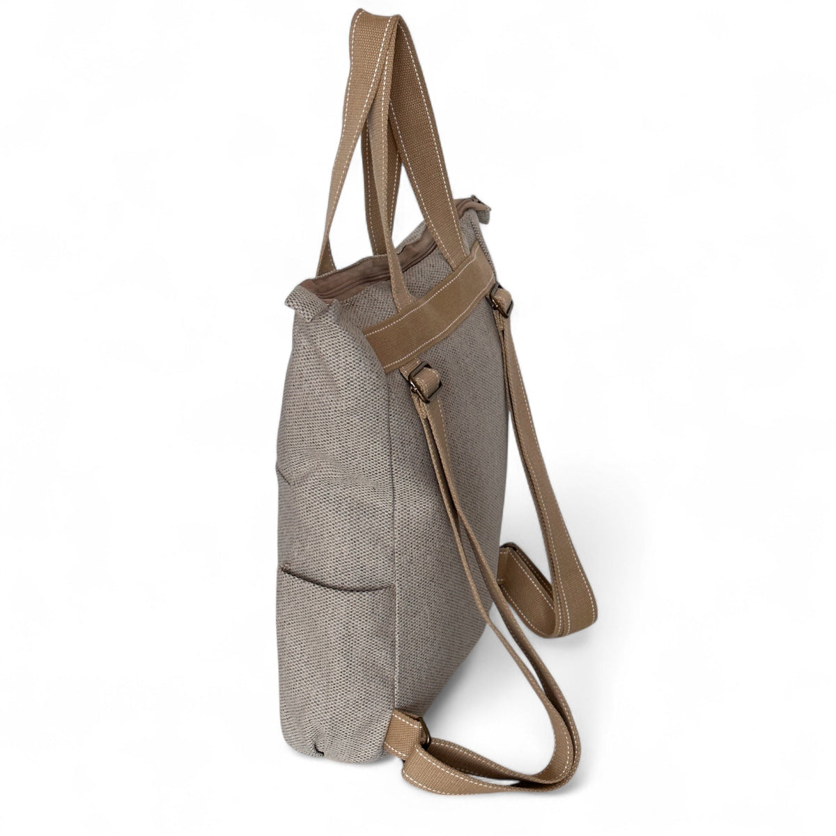 Side view of the DE LA MUR Sydney backpack showing tote handles and shoulder straps