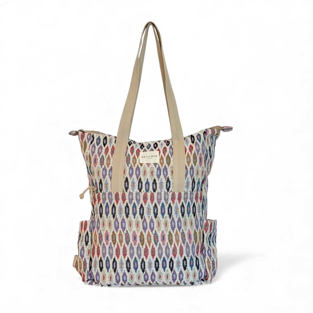 DE LA MUR Urban jacquard backpack tote in pink and lilac ikat, front view