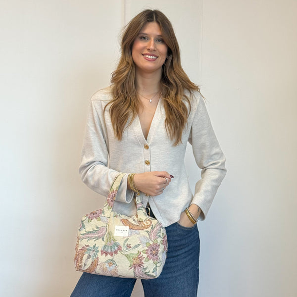 Model with the DE LA MUR Floral Jacquard Extra Large Makeup Bag – Multicolor (Color)