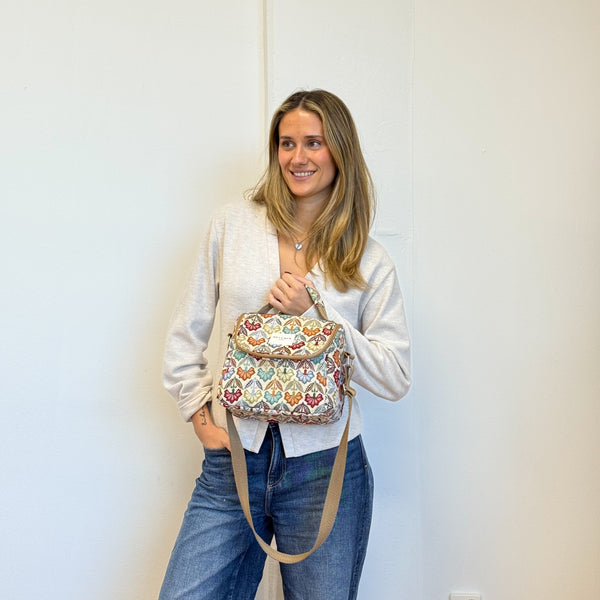 Model with the DE LA MUR Floral Jacquard Lunch Bag – Multicolor (Flora)