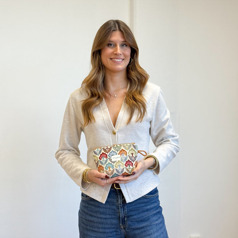 Model with the DE LA MUR Floral Jacquard Small Makeup Bag – Multicolor (Flora)