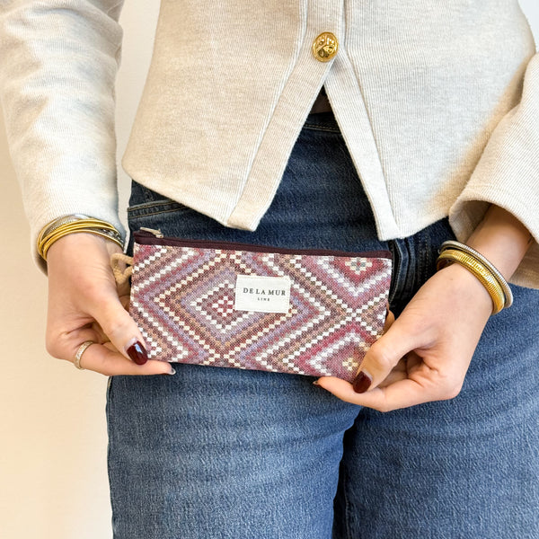 Model with the DE LA MUR Geometric Jacquard Glasses Case – Pink & Lilac (Nana)