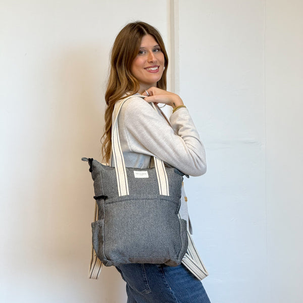 Model with the DE LA MUR Geometric Jacquard Backpack - Shoulder Bag – Navy & Cream (Sinay)