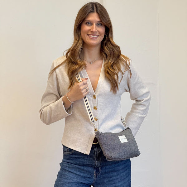 Model with the DE LA MUR Geometric Jacquard Clutch Handbag – Navy & Cream (Sinay)