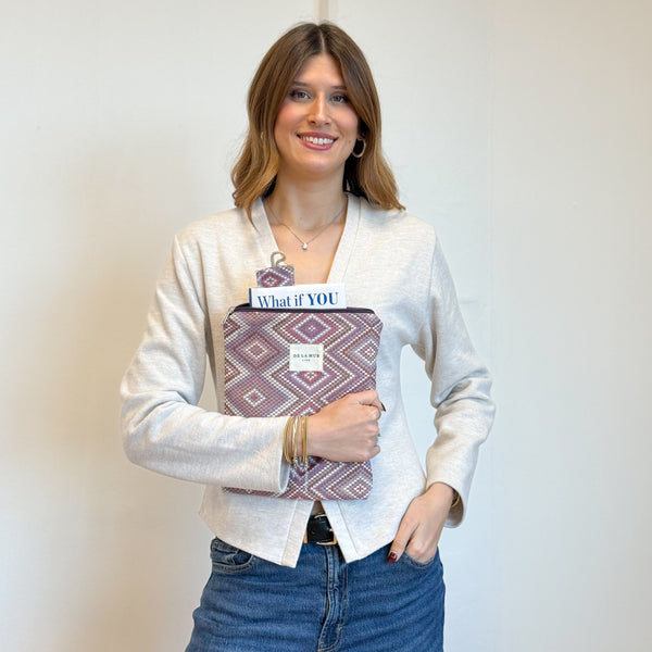 Model with the DE LA MUR Geometric Jacquard Book Cover With Matching Bookmark – Pink & Lilac (Nana)