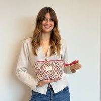 Model with the DE LA MUR Geometric Jacquard Large Makeup Bag – Terracotta & Lilac (Onda)