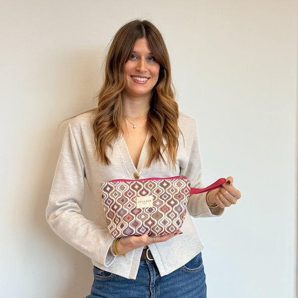 Model with the DE LA MUR Geometric Jacquard Large Makeup Bag – Terracotta & Lilac (Onda)