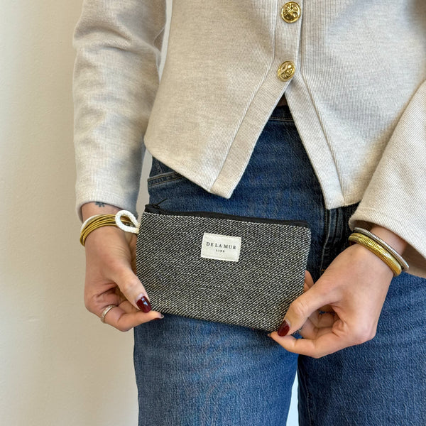 Model with the DE LA MUR Geometric Jacquard Small Makeup Bag / Coin Purse – Navy & Cream (Sinay)