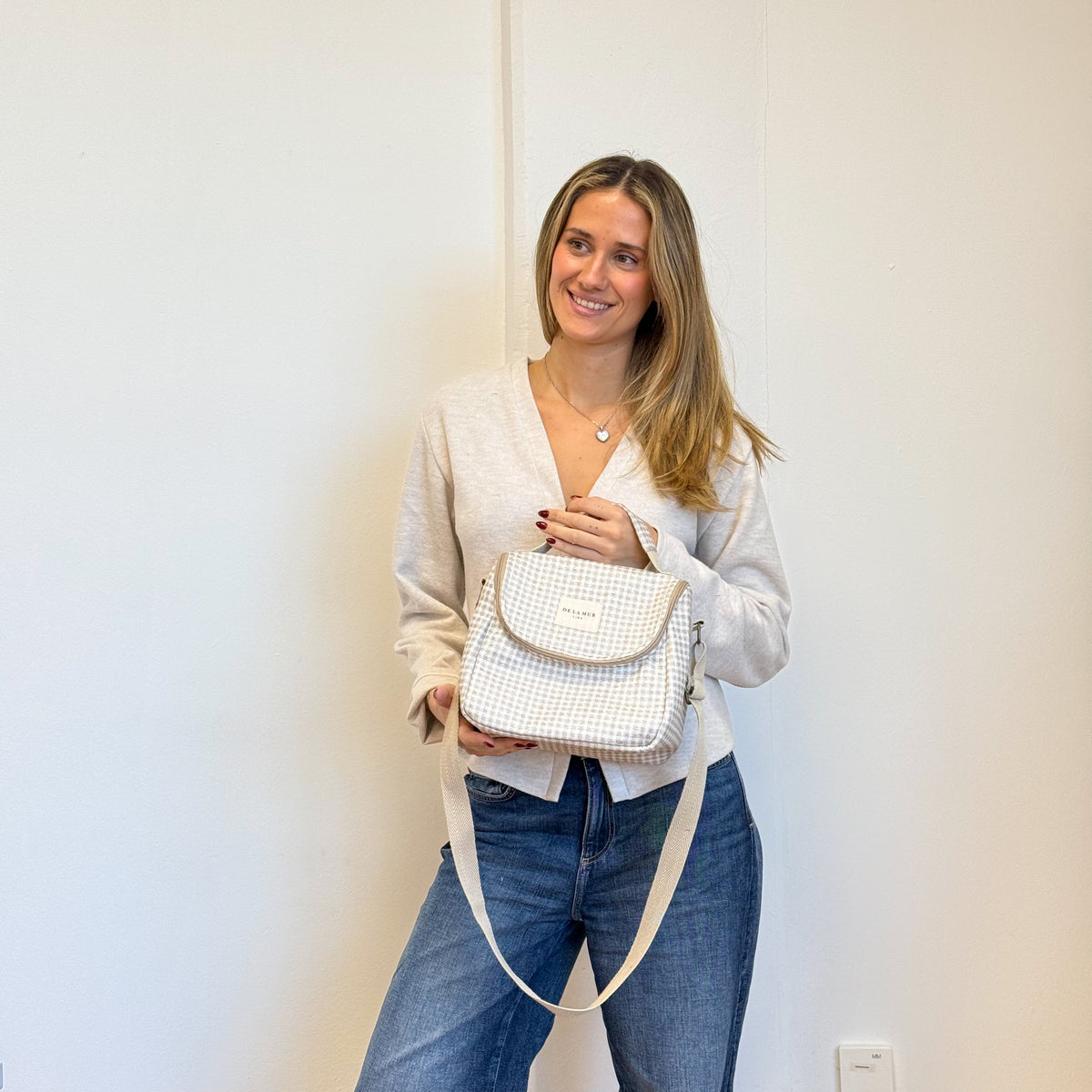 Model with the DE LA MUR Gingham Jacquard Lunch Bag – Beige & Ecru (Vison)