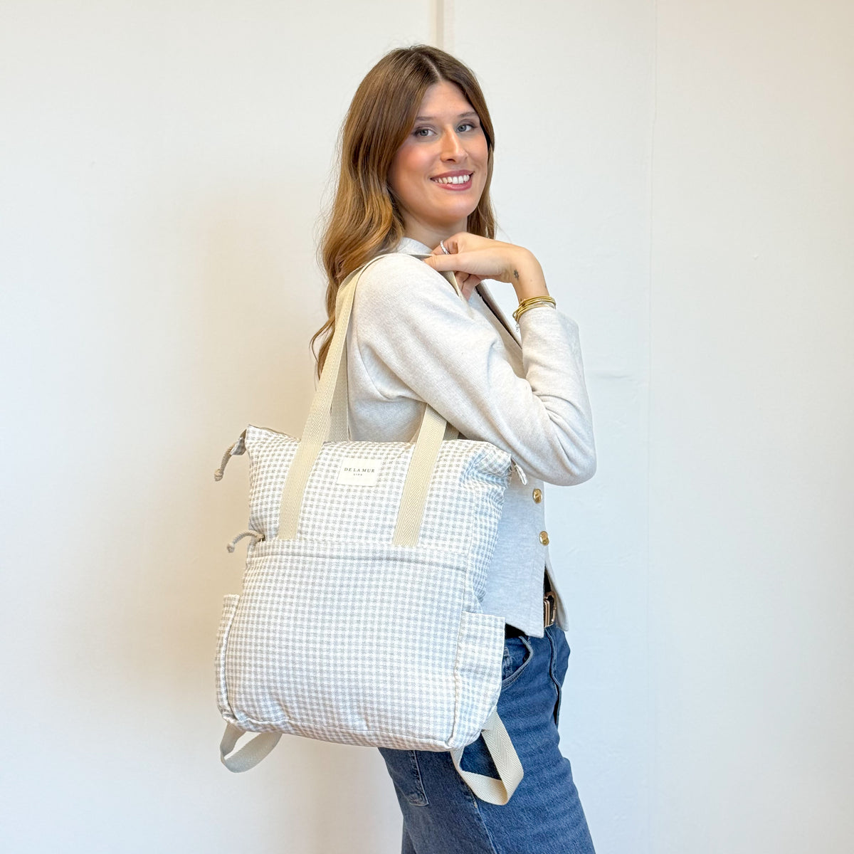 Model with the DE LA MUR Gingham Jacquard Backpack - Shoulder Bag – Beige & Ecru (Vison)