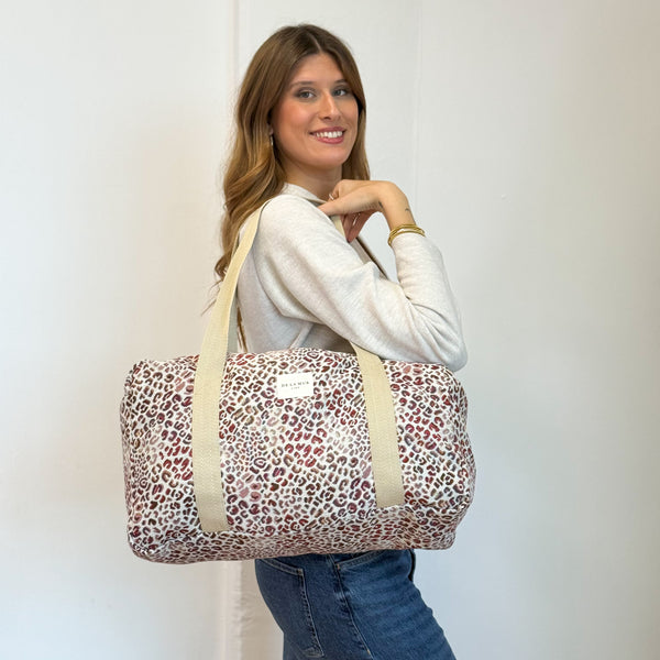 Model with the DE LA MUR Leopard Jacquard Sports Bag – Burgundy & Cream (Talco)