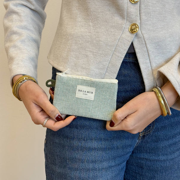 Model with the DE LA MUR Striped Coin Purse – Light Green & Green (Teo)