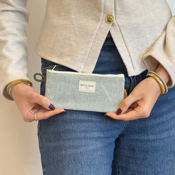 Model with the DE LA MUR Striped Glasses Case – Light Green & Green (Teo)
