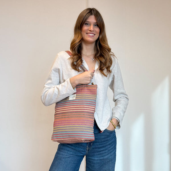 Model with the DE LA MUR Striped Jacquard Medium Zippered Tote Bag – Multicolor (Maria)